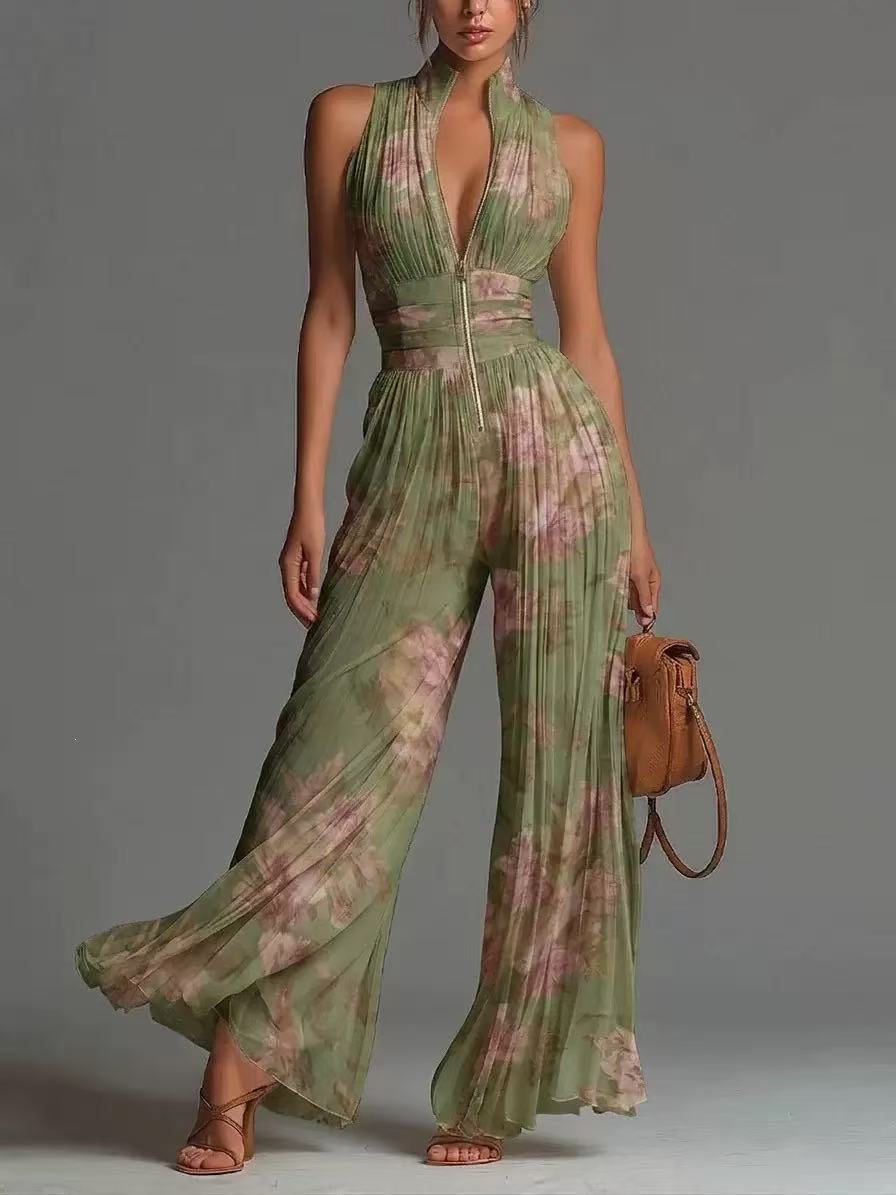 Witte chiffon-jumpsuit zonder mouwen met V-hals, rits en geplooide wijde pijpen.